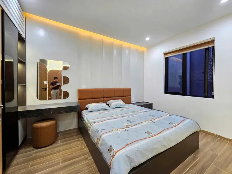 Phòng ngủ giường bọc da cam